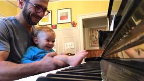 Baby plays piano with his feet!