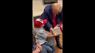 Trump gifts Liam, a boy with a brain disease, before a rally in New York