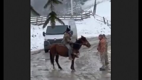 Ukrainian Military recruiters want to conscript a lumberjack on a horse in Chernivtsi