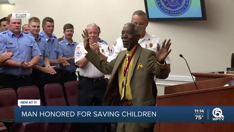 Fort Pierce man given life-saving award for pulling three children from burning car