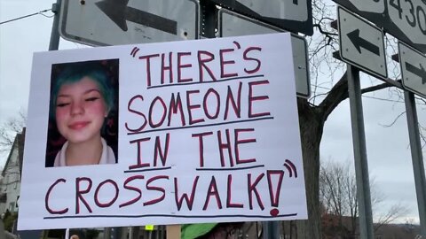 Family, friends, Jamestown community members hold a line up for 15-year-old Alexis “Lexi” Hughan