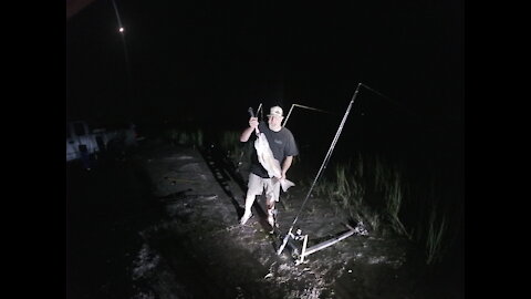 catching a redfish and a gar double hook up