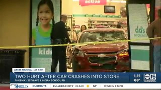 Two hurt after car crashes into Phoenix store