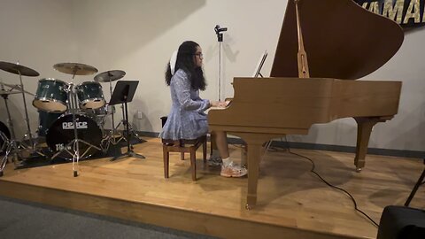 Daughter playing piano