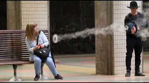 Magician Pranks People With Smoke Rings