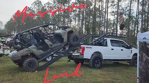 Loading our Can am Commander onto the truck rack.