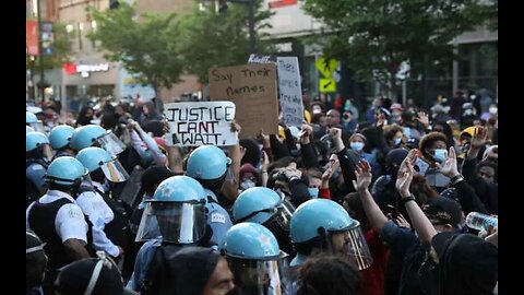 Rough Start Protesters Tear Down Security Fence as Thousands March Outside DNC