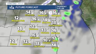 Slightly warmer and breezy Wednesday, with highs around 50