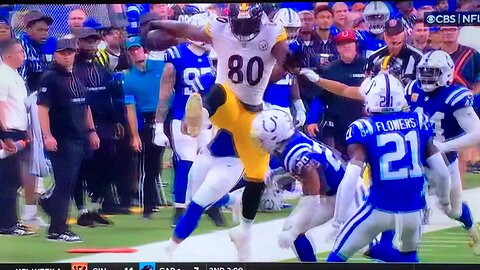 Steelers TE #80 Darnell Washington leaping over DB’s in a single bound.