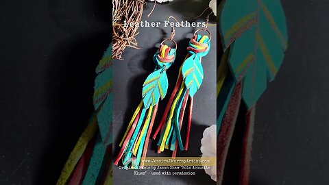 CORAL CORRAL, 6 inch feather leather earrings