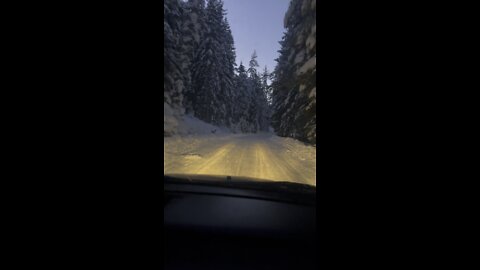 Drifting in a snow road up into the mountains