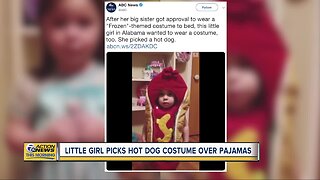 Little Girl picks hot dog costume over pajamas