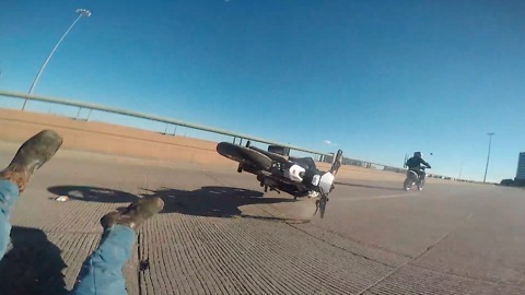 High-speed motorcycle wheelie ends in epic fail