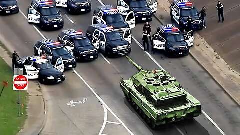 Cops try to stop tank. Then this happens...