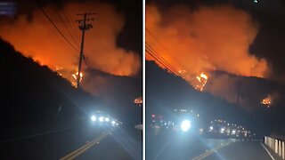 Apocolypic view of hillside during Bond Fire in Orange County