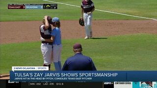 Tulsa Little League player hugs pitcher