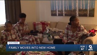 Dunkin' employee surprised with new home moves in, celebrates Christmas