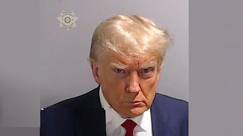 Trump booked at Fulton County jail in Georgia election interference case