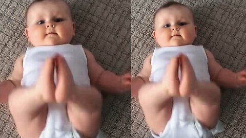 Child clapping with his feet.