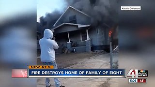 Fire destroys home of family of eight