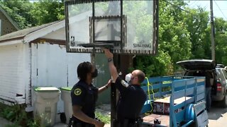 Milwaukee police donate basketball hoops to kids in the community