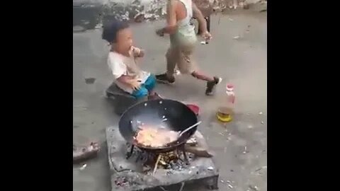 Five-year-old Chinese Boy Skillfully Cooks Fried Rice for Himself & His Two-year-old Brother