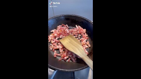 Pasta with a creamy sauce, bacon and mushrooms