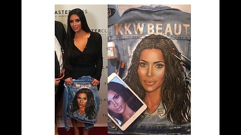 Portrait of Kim Kardashian on denim jacket