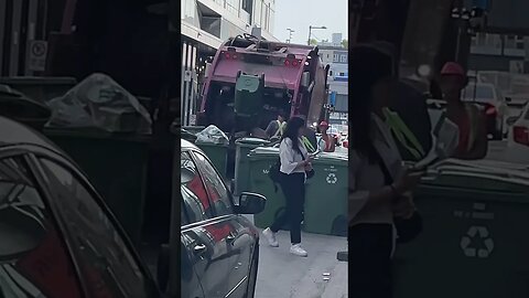 Rush hour garbage collector at Old Montréal