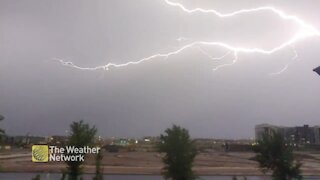 Large streaks of lighting stretch across the night sky