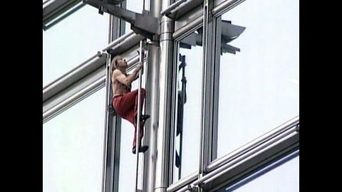 French 'Spiderman' Climbs Hong Kong High Rise