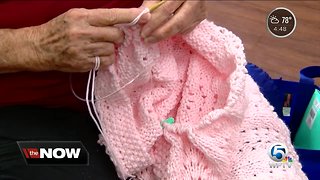 Royal Stitchers making hats for newborn babies