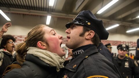 Radical Leftist Harasses Police Officer