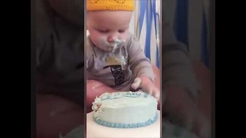 Baby and the cake