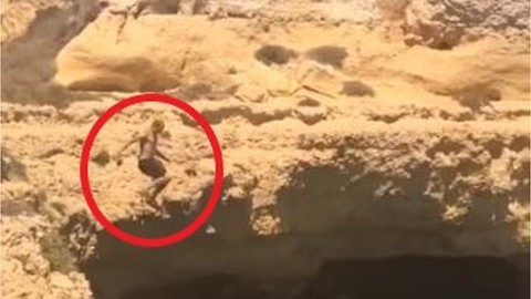 Man Jumps Off 50 Feet Cliff