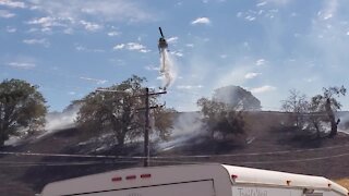 Helicopter drops water on Arosa Fire in Tehachapi