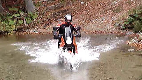 ktm 990 adventure in the river tatra Goethe Water mountan