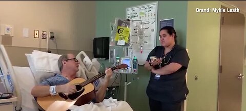 Nurse and cancer patient sing