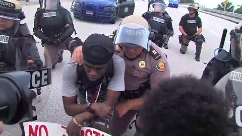 FHP troopers kneel in solidarity with protesters in Boca Raton