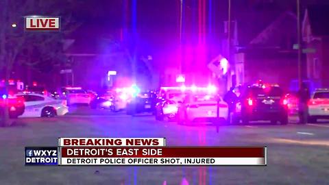 Police on scene of barricaded suspect after police officer wounded on Detroit's east side