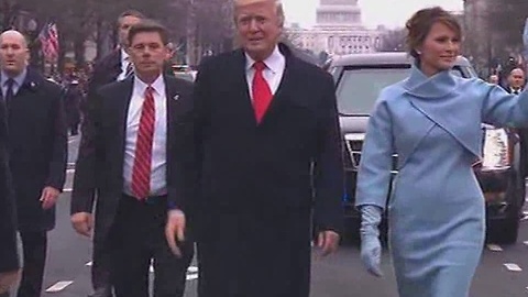 President Trump and First Lady walking in inaugural parade