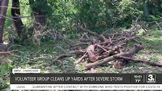 Team Rubicon volunteers helping Omaha-area residents cleanup storm debris