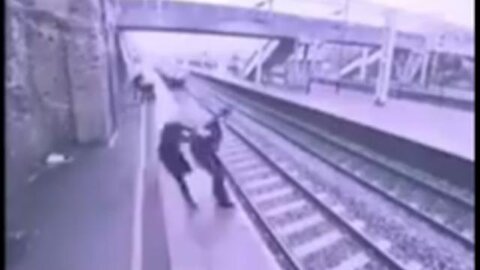 😇 Angel 😇 Stranger Saves Man From Jumping In Front of Speeding Train. Caught On Camera