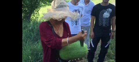 Mongolian way of cutting watermelon