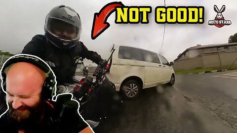 Biker slips and slides his way into a van!