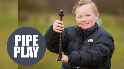 A defiant schoolboy has become the first person in the world to learn to play the bagpipes