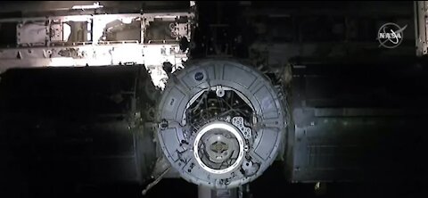 Astronauts dock at International Space Station