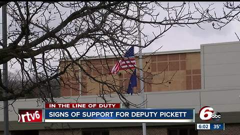 Community members honor Deputy Pickett with luminaries, notes of thanks