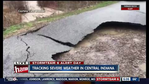 Heavy rain leads to flooding, rescues and a fire in central Indiana