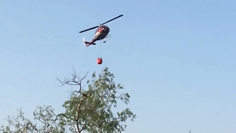 Watch this water bomber helicopter fighting fire in slow motion in Prince National Park. SK